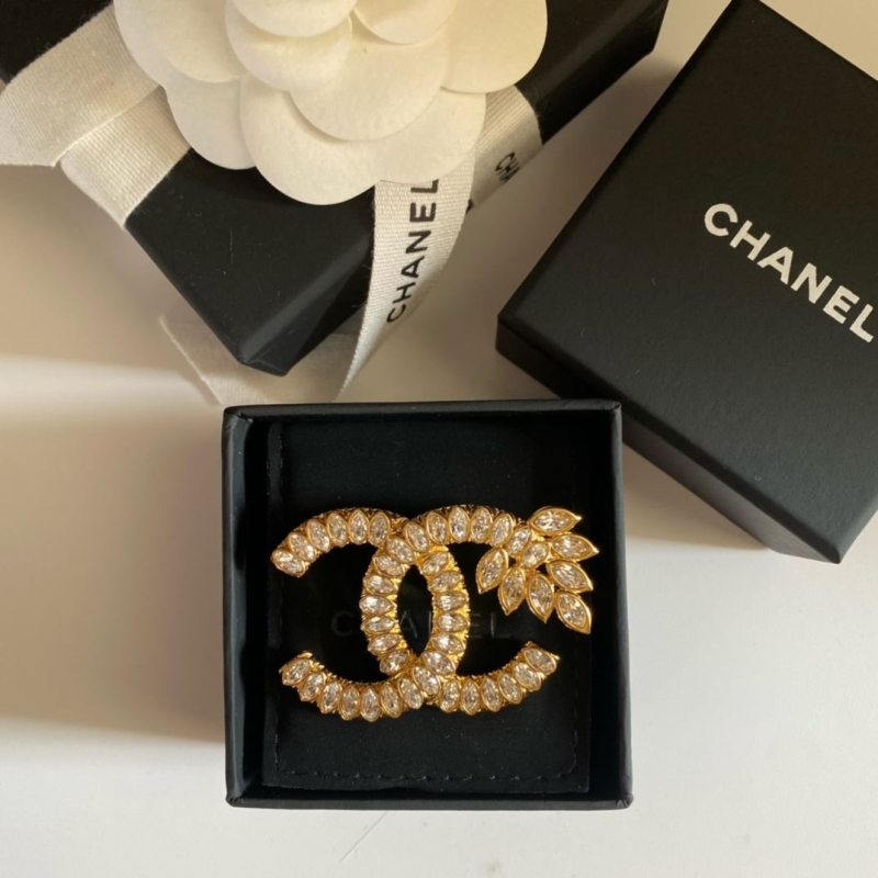Ch**el brooches
